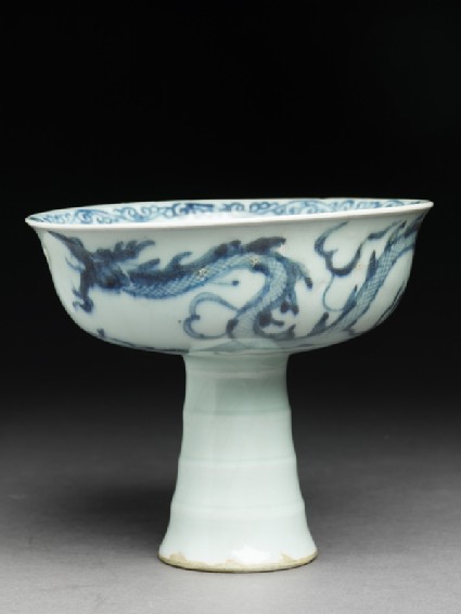 Blue-and-white stem cup with a dragon and cloudsside