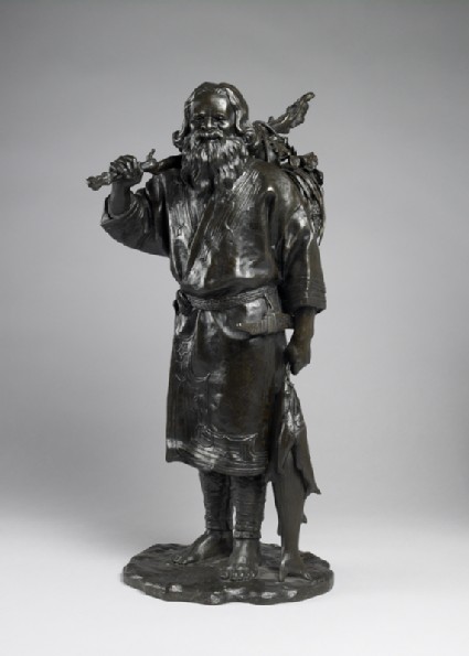 Figure of an Ainu fisherman with his catchfront