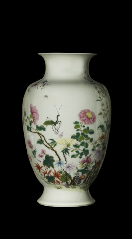 Vase with insects and flowersside