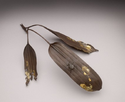 Okimono, or ornament, in the form of bamboo leaves and a cicadaoblique