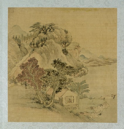 Landscape with a figure standing in a housefront