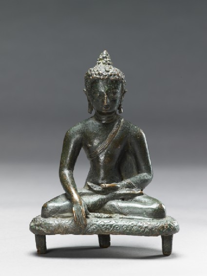 Seated figure of the Buddhafront
