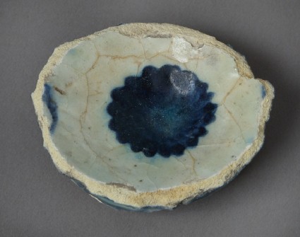 Base fragment of a bowl with rosettefront, front
