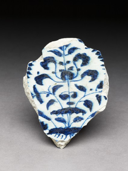 Base fragment with floral decoration in blue on whitefront