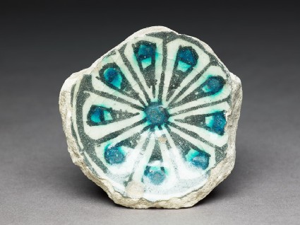 Base fragment of a bowl with radial decorationfront