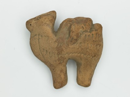Figure of a camel with fragment of a riderfront