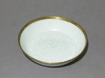 White ware dish with floral decorationoblique