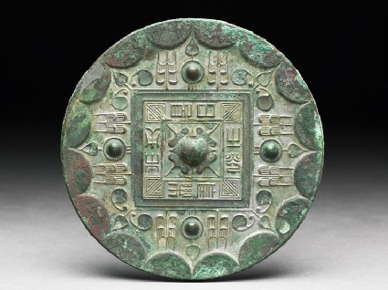 Ritual mirror with inscription in lishu, or clerical scriptback
