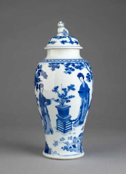 Blue-and-white jar and lid with female figures in a garden landscapeside