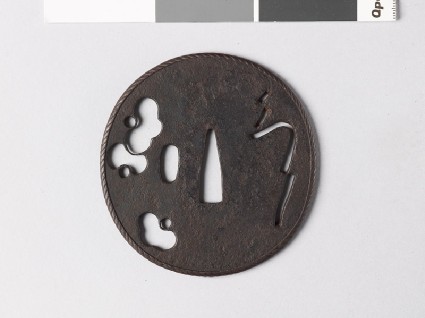 Tsuba with flowers and Japanese charactersfront