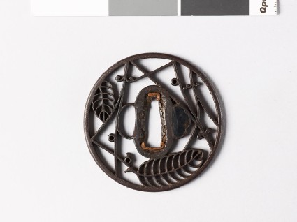 Round tsuba with oak leaves and pine needlesfront