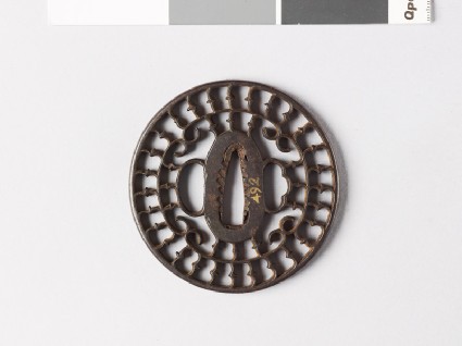 Tsuba with karigane, or flying geese, and c-scrollsfront