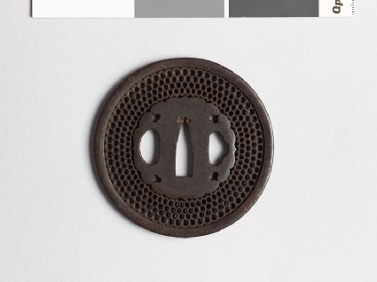 Round tsuba with aoi, or hollyhock leaves, or snow heapsfront