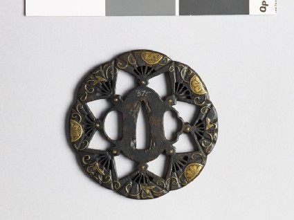 Lobed tsuba with flowers and fansfront