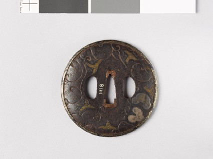 Tsuba with leaves and scrolling stemsfront