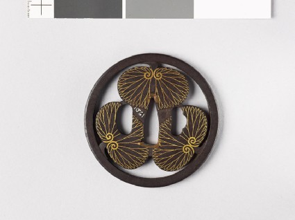 Round tsuba with three aoi, or hollyhock leavesfront