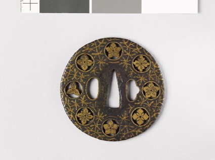 Round tsuba with flowers and water weedsfront
