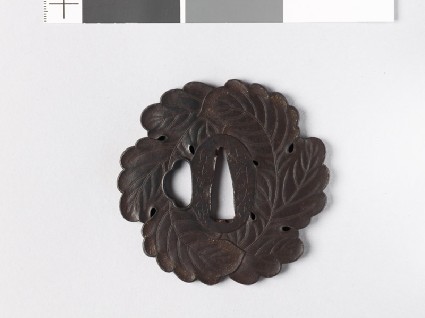 Tsuba in the form of two overlapping oak leavesfront