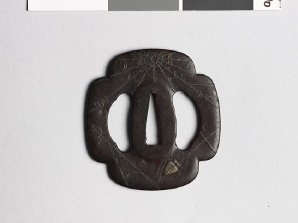 Mokkō-shaped tsuba with spider and cobwebfront