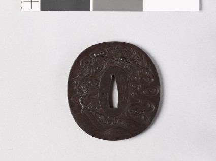 Tsuba with dragon, cloud, and wavesfront