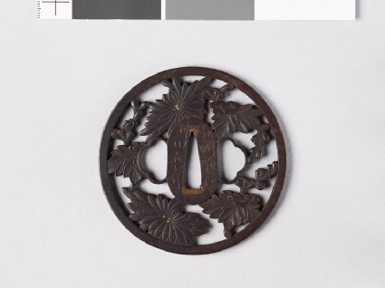 Round tsuba with chrysanthemums and dewdropsfront
