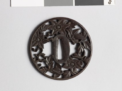 Round tsuba with clematis vinefront