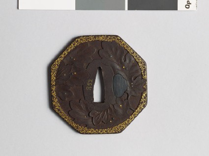 Octagonal tsuba with chrysanthemum leaves and dewdropsfront