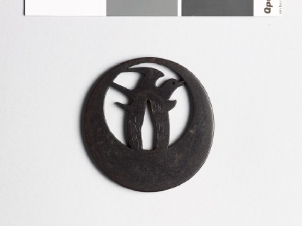 Tsuba with a cuckoo flying across a full moonfront