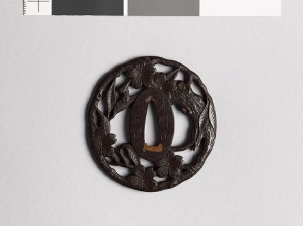 Tsuba with cherry trunk and flowersfront