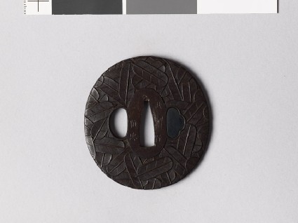 Tsuba with heraldic hawk feathersfront