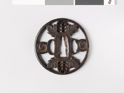 Tsuba with leaves and scrollsfront