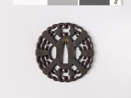 Round tsuba with tea whisks and karigane, or flying geesefront