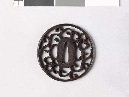 Tsuba with floral scrolls and Chinese flowersfront