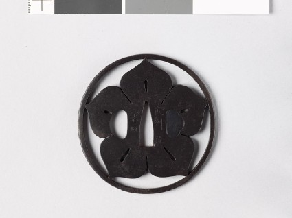 Tsuba with mon formed from a clematis flowerfront