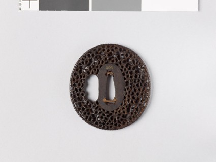 Tsuba with scrollworkfront
