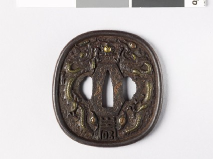 Tsuba with dragons and shishi, or lion dogsfront