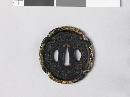 Mokkō-shaped tsuba with insects, autumn flowers, and dragonsfront
