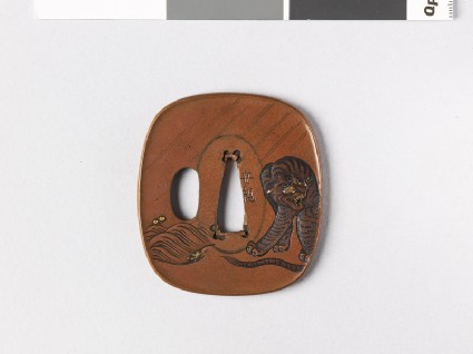 Tsuba with snarling tiger near wavesfront