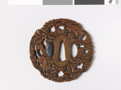 Mokkō-shaped tsuba with vine and squirrelsfront