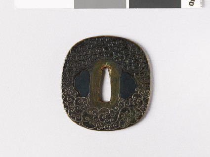 Tsuba with scrolling stemsfront