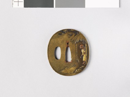 Tsuba depicting a man with a fox trapfront