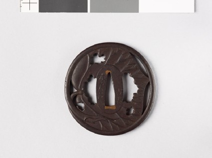 Tsuba with decaying aoi, or hollyhock leaffront