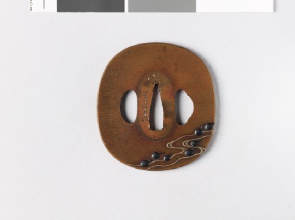 Tsuba with tadpoles swimming in a streamfront