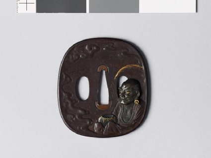 Tsuba depicting Handaka Sonja, a disciple of Buddha, holding a begging bowlfront