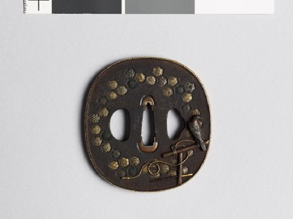 Tsuba with octagons containing geometric diapers, and a hawkfront