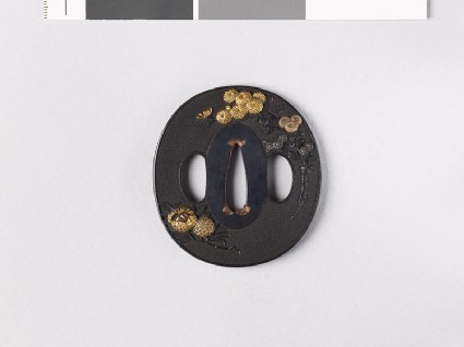 Tsuba with chrysanthemums, asters, and chestnutsfront