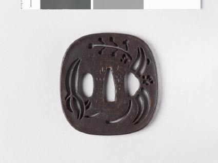 Tsuba with arrowhead leaves and flowersfront