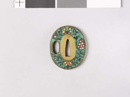 Tsuba with flowers, clouds, and karakusa, or scrolling plant patternfront