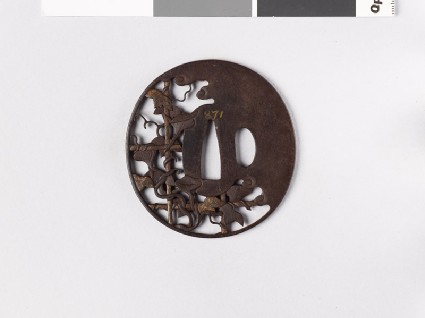 Tsuba with morning glory growing over a bamboo latticefront