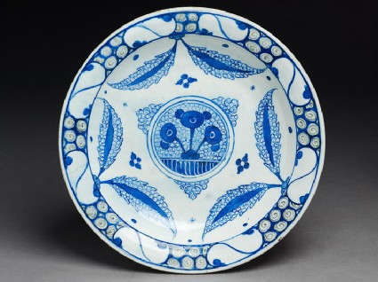 Dish with central medallion and leavestop